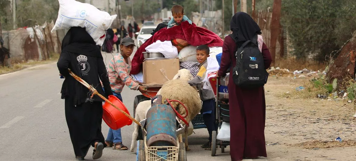 A Palestinian family flees Rafah amid the ongoing conflict between Israel and Gaza.