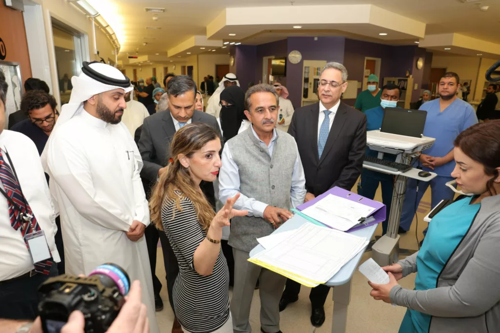 Minister Kirti Vardhan Singh speaks to Jaber Hospital authorities