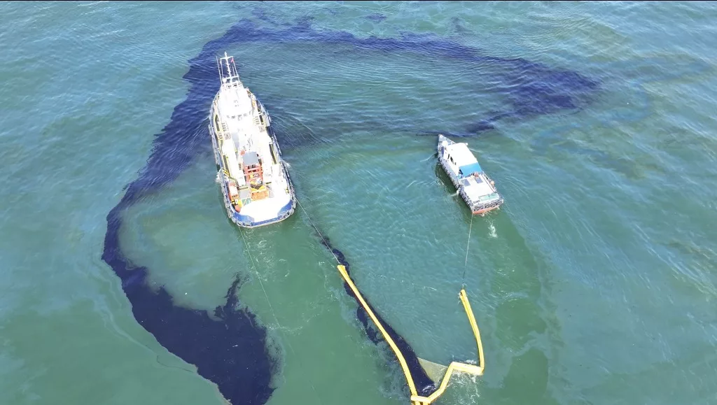 Drone image of vessels towing the Current Buster System to capture oil spill off Labrador Nature Reserve on 17 June. Photo courtesy: Maritime and Port Authority of Singapore.