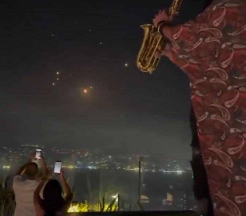 Viral video shows Lebanon rooftop party amid night sky streaked with missiles targeted by Israel and Iran