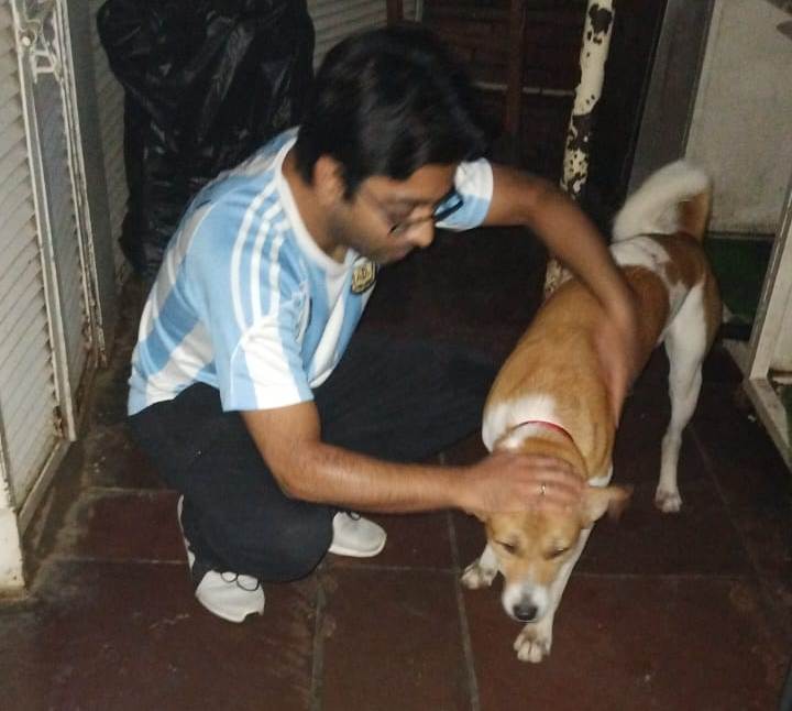 Akaash with a street dog